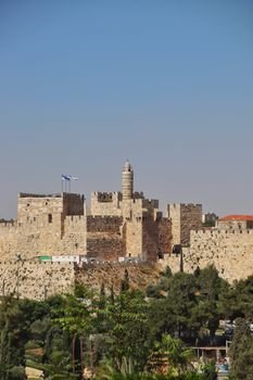 Historic Tower of David citadel under clear skies in Jerusalem.