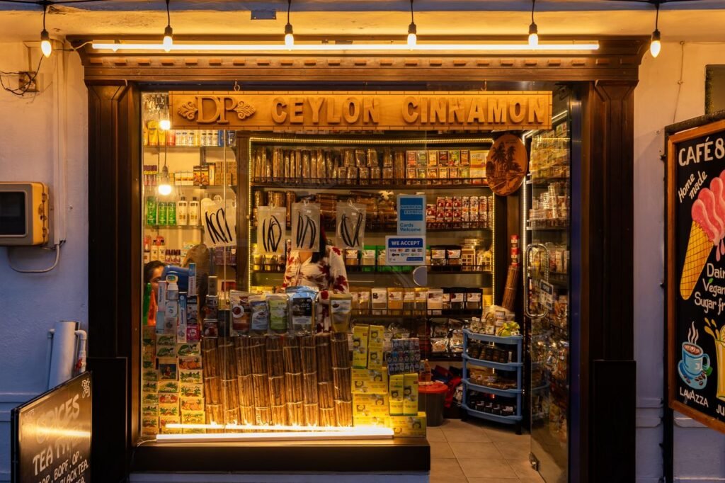 Charming evening view of a Ceylon cinnamon store in Galle, Sri Lanka, showcasing spices and local goods.