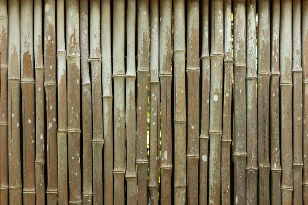 Close-up of a vertical bamboo fence showcasing natural patterns and textures.